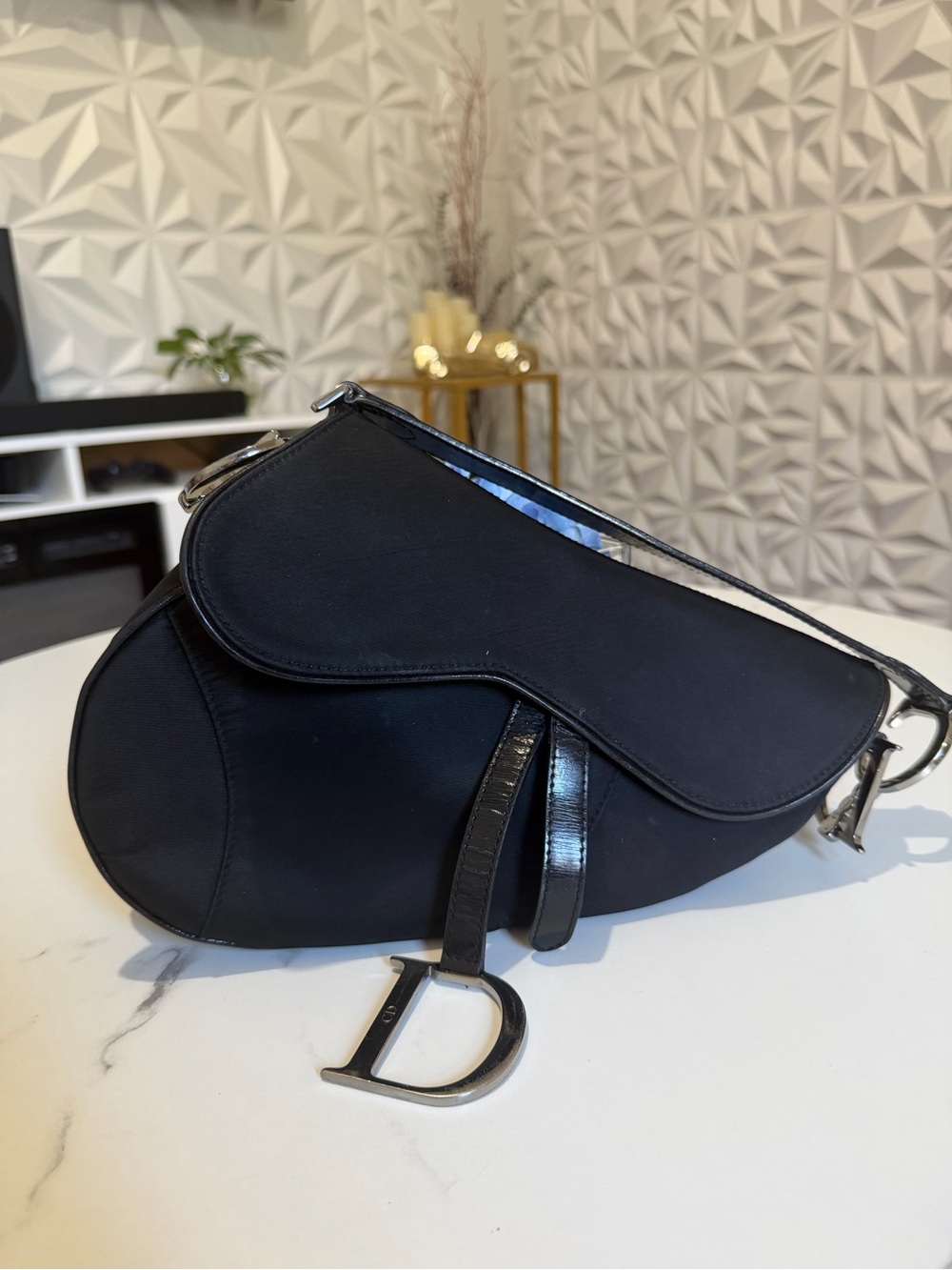 Elegant Black Saddle Shoulder Bag with Silver D Accent